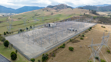 Drone aerial photograph of the Snowy Hydro Tumut 3 transformer substation near Talbingo in the Kosciuszko National Park in the Snowy Mountains in New South Wales in Australia.