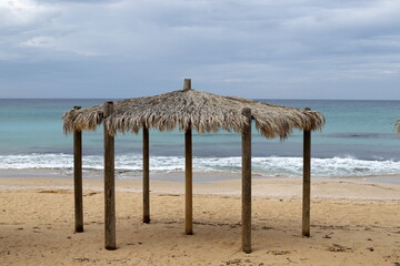 A canopy for protection from the hot sun in a city park.