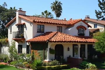 Elegant Spanish revival house with red tile roof