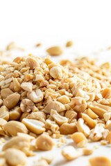 A compact pile of peanuts sitting on a table
