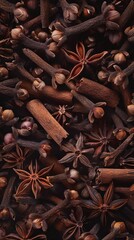 top down view of pile of cloves and cinnamons 