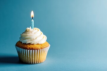 Delicious Cupcake with Single Candle Against Blue Background, Perfect for Celebrations and Birthdays