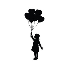silhouette child holding heart shaped balloon

