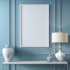An empty white mockup frame on a pristine blue wall, with a modern table lamp and a decorative vase on a side table.