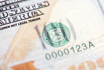 Obraz premium Close-up of one hundred US dollar paper currency