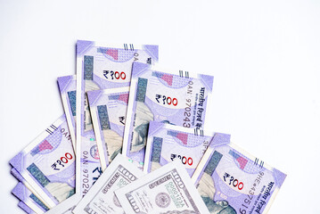 US dollar and Indian currency exchange rate. Close-up of US dollar and Indian currency.