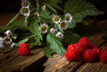 raspberries on a wooden background