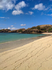 Kuta Lombok has beautiful beaches and surf spots, Kuta Mandalika Beach Lombok, beach with blue sky and clouds, beach in the summer, beach with trees