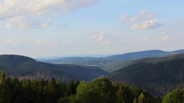 Cloud time lapse above hills valley, national park Sumava, Czech landscape
