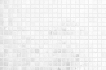 White tile wall chequered background bathroom texture. Ceramic brick wall and floor tiles mosaic...