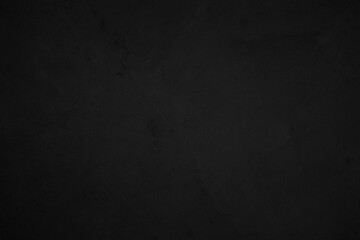 Black dark concrete wall background. Pattern board cement texture grunge dirty scratched for show anthracite promote product urban floor and abstract paper design element decor. Blackboard blank.