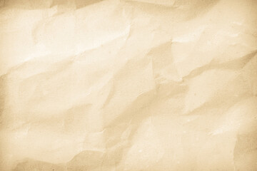 Crumpled brown paper texture background for design with copy space for text or image.