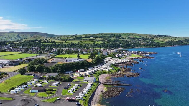 Aerial View of Cushendall Caravan Park and Lurig Caravan Club on the Irish Sea Cushendall Co Antrim Northern Ireland on a sunny day 27-07-24 
