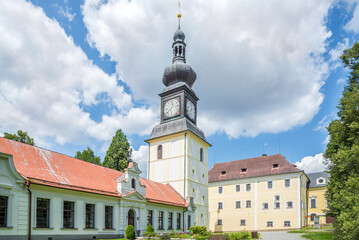 Obraz premium View at the Bell tower of Basilica of Assumption of Our Lady in Zdar nad Sazavou, Czech Republic