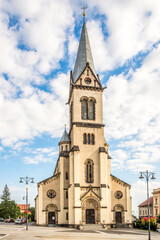 Fototapeta premium View at the Church of Assumption of Virgin Mary in the streets of Kladno town in Czech Republic