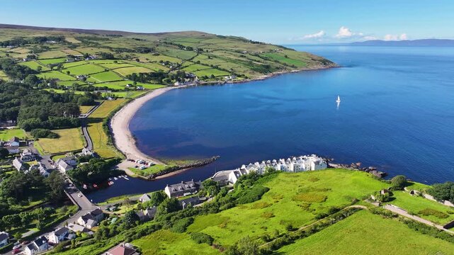 Aerial View of Glendun Cushendun on the Irish Sea Co Antrim Northern Ireland on a sunny day with a blue sky 