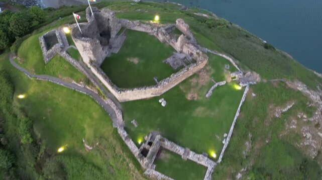 Aerial video over Castell Cricieth near Criccieth Beach Criccieth UK