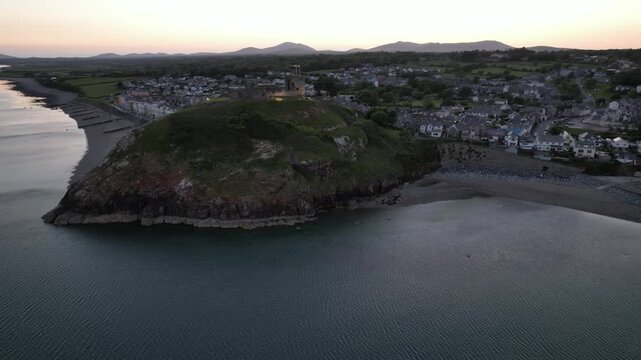 Aerial video over Castell Cricieth near Criccieth Beach Criccieth UK