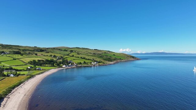 Aerial View of Glendun Cushendun on the Irish Sea Co Antrim Northern Ireland on a sunny day with a blue sky