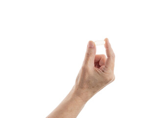 Mid aged female hold transparent pill isolated on white