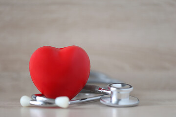 World health day,Red heart shape and stethoscope on wooden background,Health care and cardiovascular health concept,Heart diseases