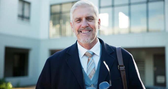 Mature man, professor and portrait at graduation for knowledge, education and pride for class success. Male lecturer, glasses and smile on campus for event, professional and shared wisdom at building