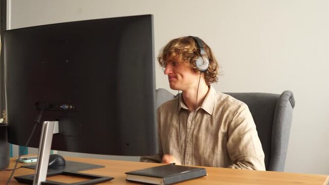 man is nervous near the computer