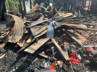 House Ruined by Fire. Fire Caused by Short Circuit. Fire Disaster. Interior of Wooden House Consumed by Fire.