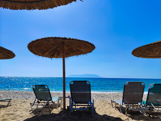 lounge chairs on the beach