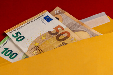 new yellow paper envelopes with euro cash