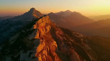 Scenic aerial top view to gold sheer crags on mountain ridge illuminated by setting sun under clear sky in golden sunset tones Evening alpine landscape in sunset color Light and shadow : Generative AI