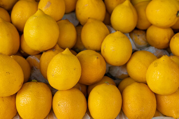yellow lemons placed together as background