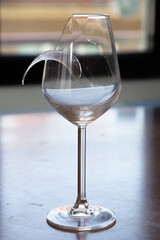 Broken glass of wine. Sadness after the breakup