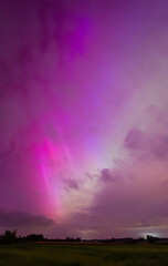 Spectacular Display of Colorful Aurora Lighting Up the Night Sky Over the Mountains