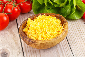 Shredded cheese in the bowl