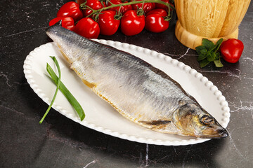 Whole raw salted herring fish