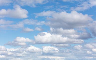 White clouds against a blue sky