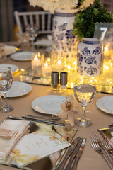 Minimalist Table Setting with White Tablecloth and Floral Centerpiece