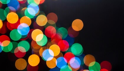 Colorful abstract lights on black background.Defocused image.