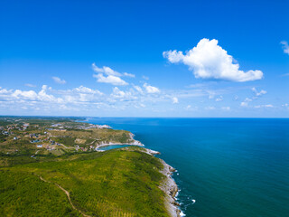 Fototapeta premium amazing coastline aerial view in cloudy summer day