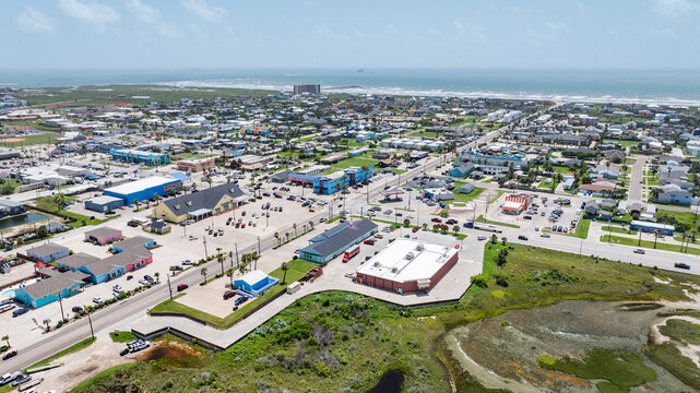 panoramic aerial city view of Port Aransas located on Mustang Island at Gulf of Mexico with beach and ocean in the background