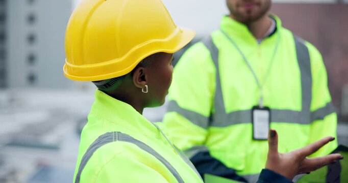 Business people, technician and meeting with laptop on rooftop for construction or industrial project in city. Contractor or civil engineer talking to colleague on computer for building maintenance