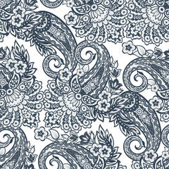 Paisley vector seamless design featuring stunning flowers and leaves in a batik-inspired style. Vintage backdrop