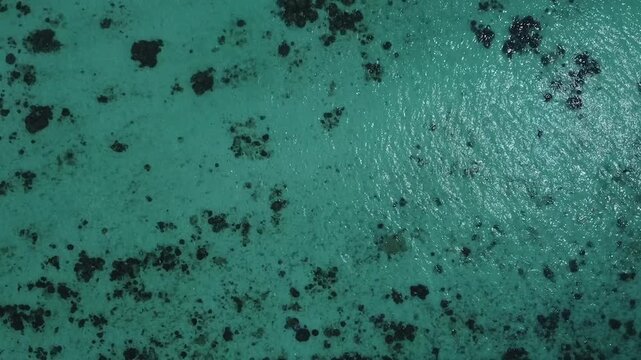 drone footage of water on north point beach in koh lipe thailand