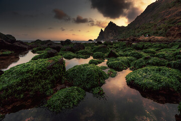 sunset over Watu Lumbung Beach Gunung Kidul Yogyakarta Indonesia