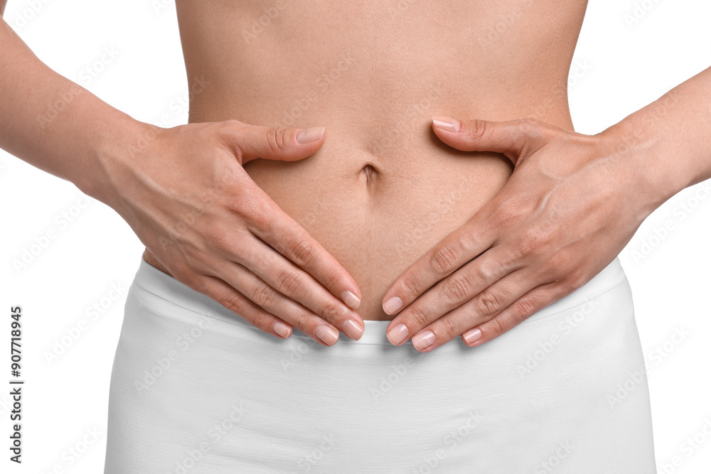 Wall mural Healthy digestion. Woman making heart shape with hands near her belly on white background, closeup