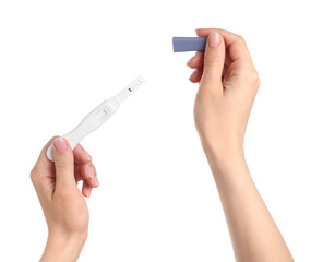 Woman holding pregnancy test on white background, closeup