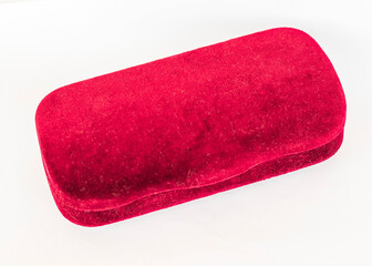Close up shot of the glasses case made of red velvet. Object