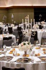 Formal Dining Arrangement with Floral Centerpieces

