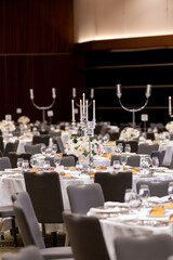 Formal Dining Arrangement with Floral Centerpieces


